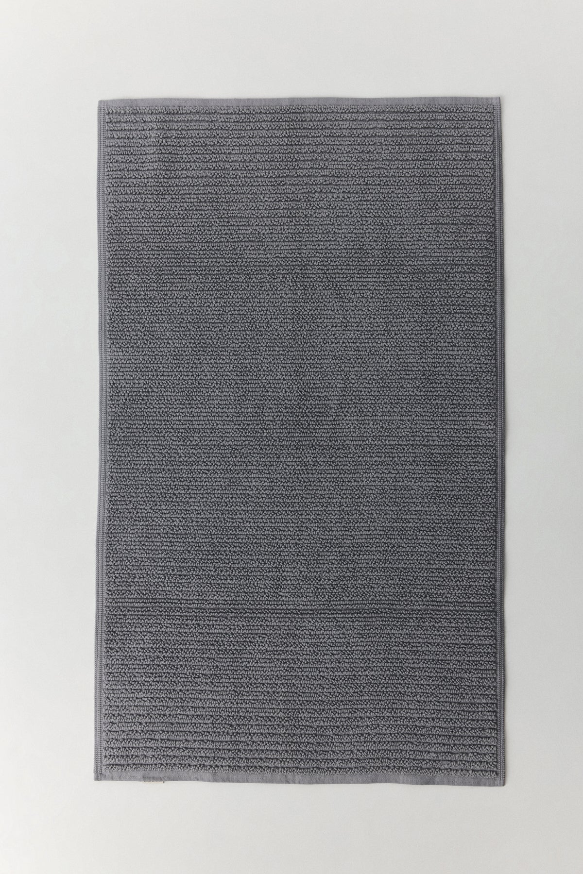 Leda bath mat in natural Turkish cotton with textured weave