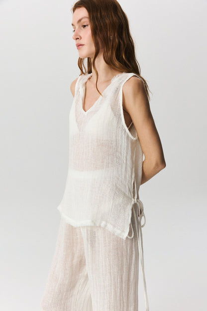Savana cropped linen top with adjustable side ties and raw-edge hem