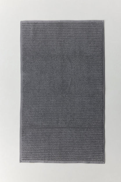 Leda bath mat in natural Turkish cotton with textured weave