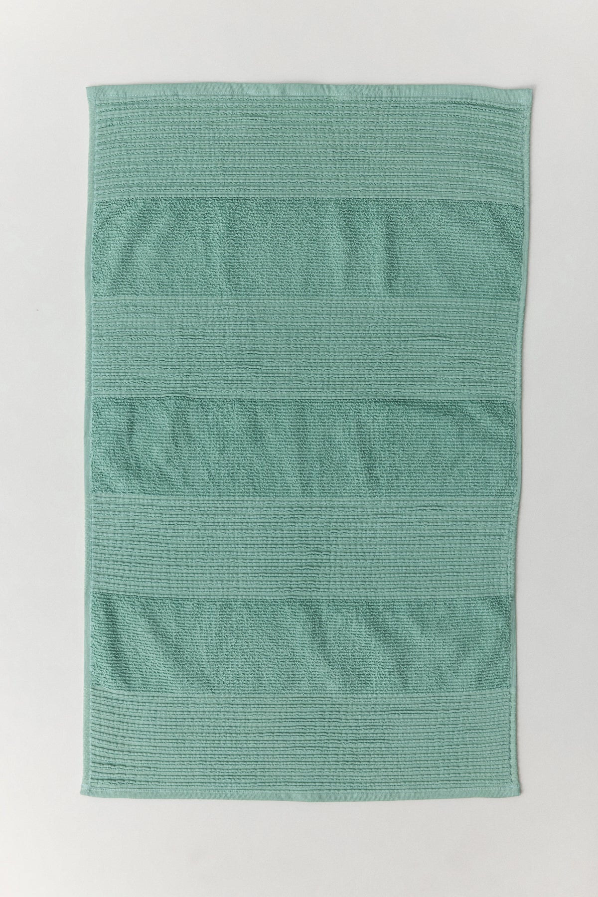 Sardes foot towel in mango yellow with self-striped cotton weave