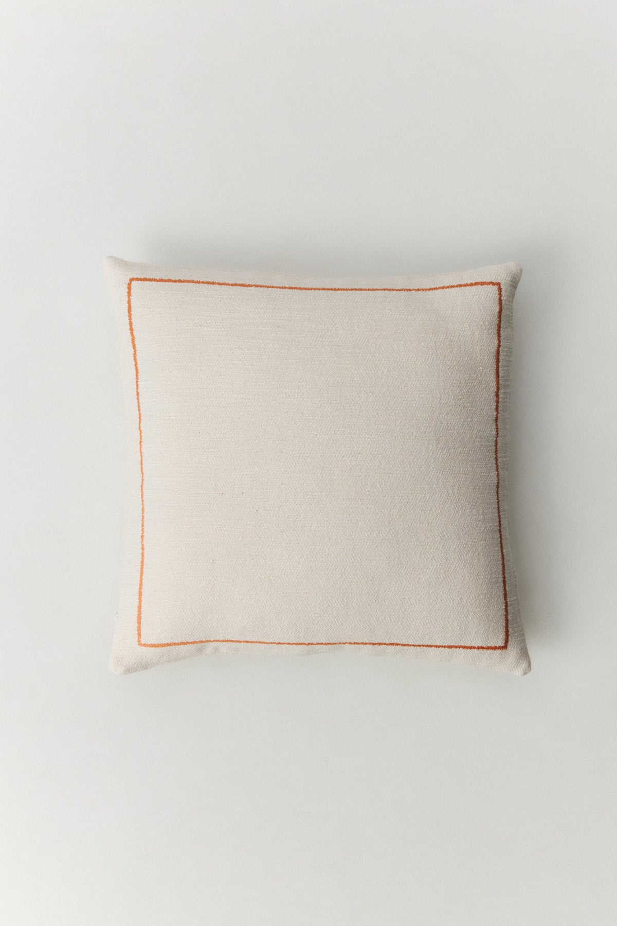 Demre embroidered cushion cover in navy on textured fabric