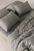 Pura melange duvet cover set in natural cotton with mother-of-pearl buttons