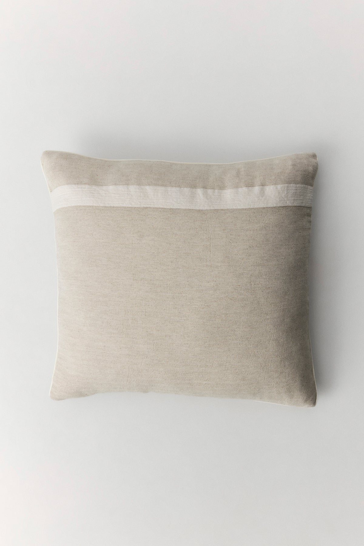 Pirene linen and Tencel cushion with handmade pompom and piped edge details