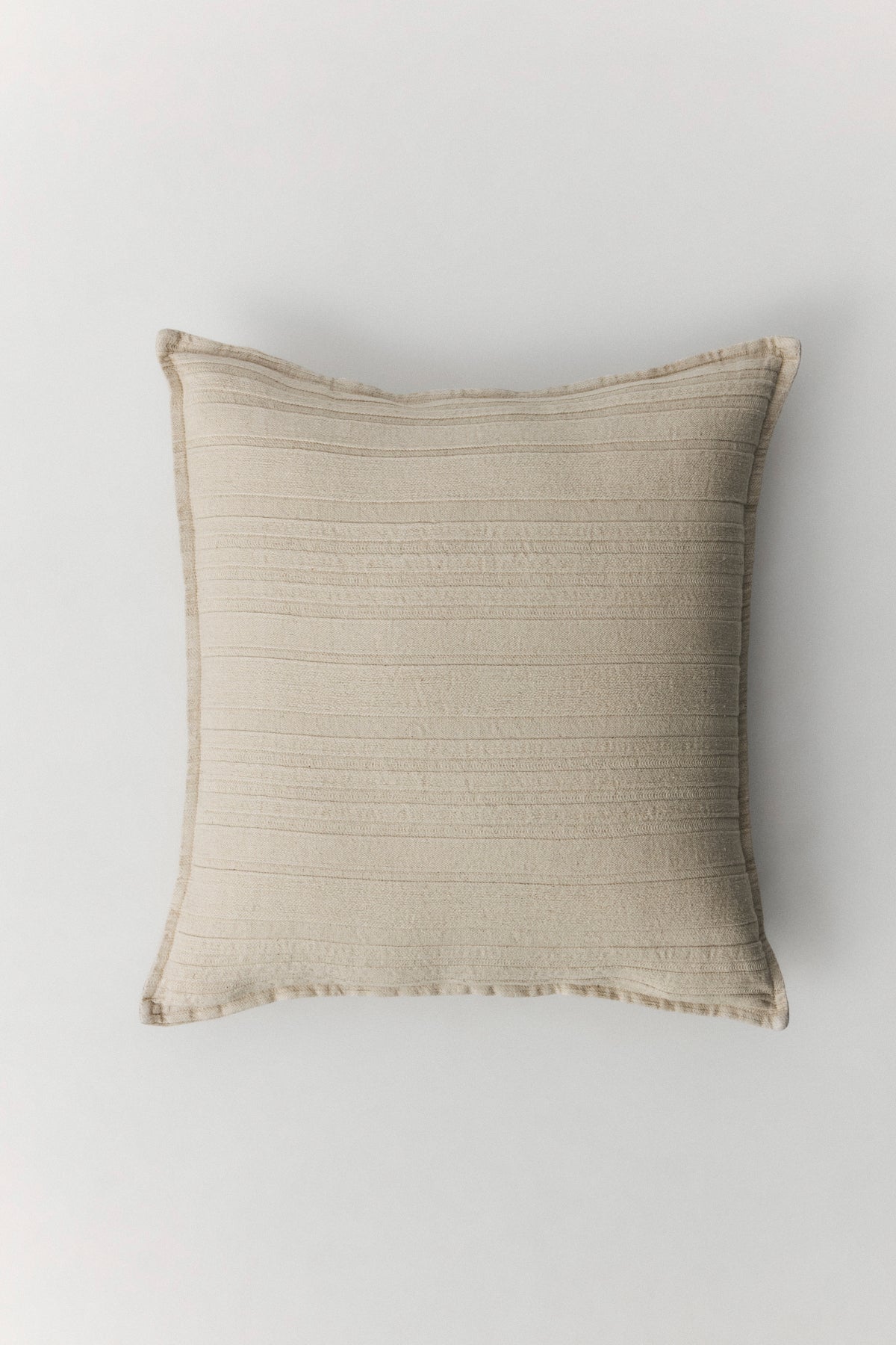 Oscar linen cushion in terra with three-dimensional textured weave and square form
