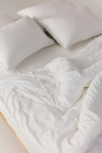Crinkle duvet cover set with natural texture and fringe detail
