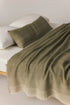 Amaya reversible linen throw in khaki with natural fringe detail