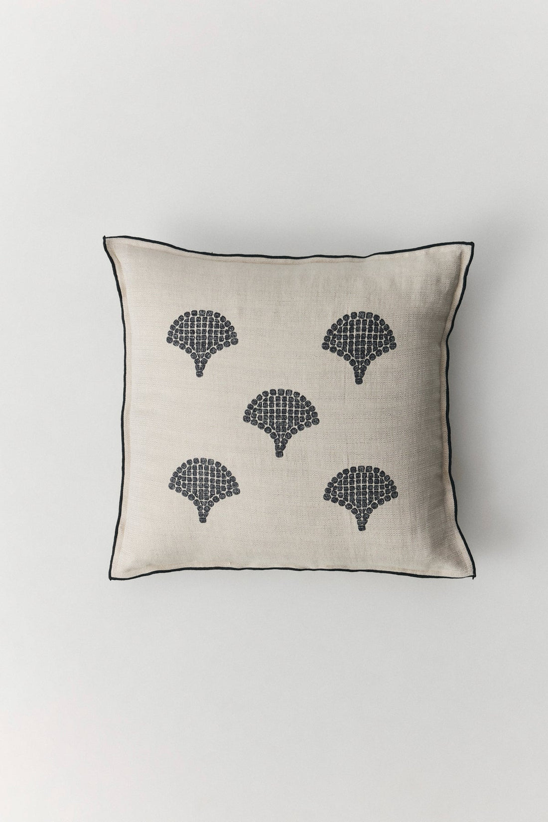 Anthea embroidered cushion with mosaic-inspired pattern and contrast border