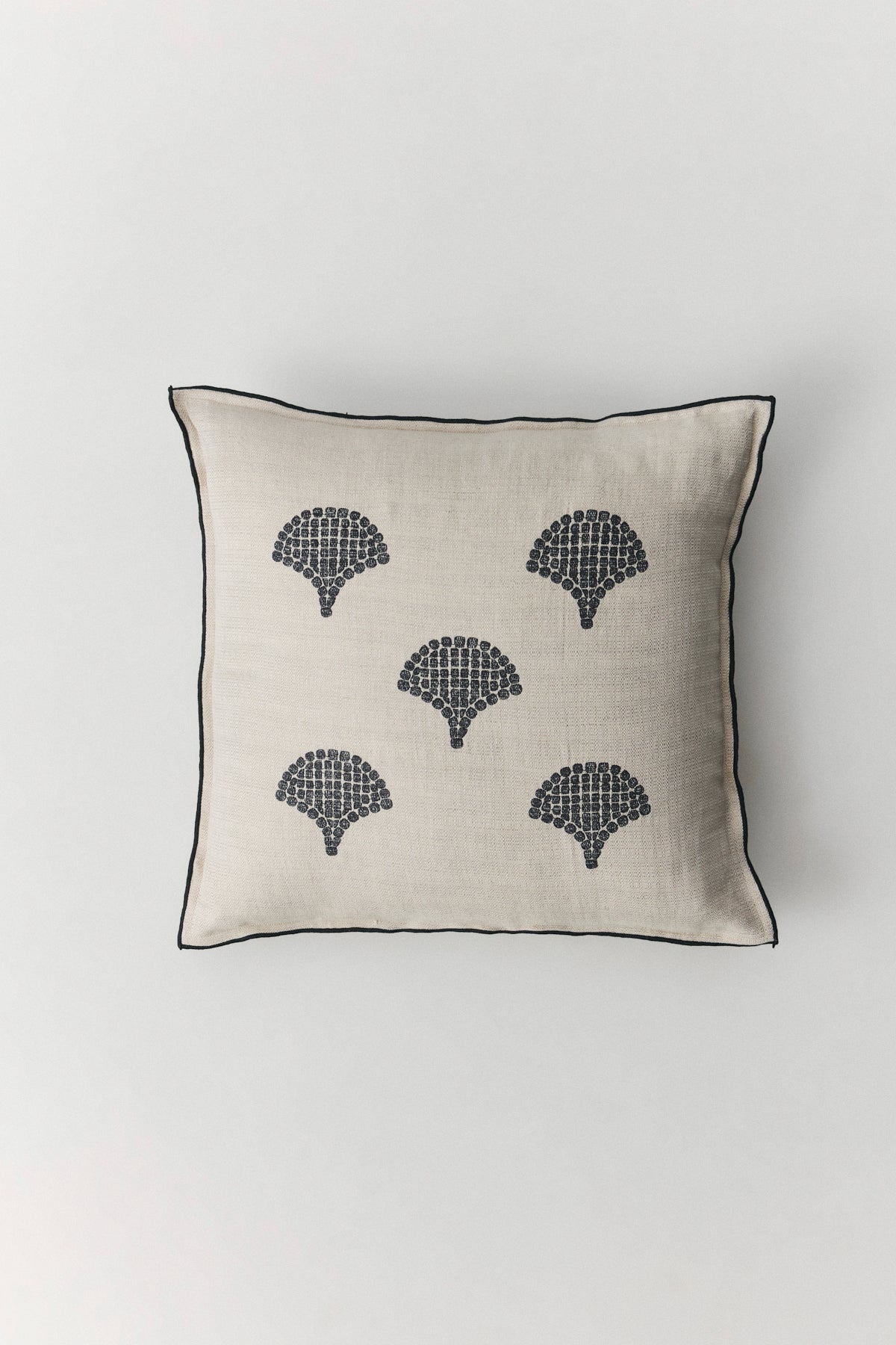 Anthea embroidered cushion with mosaic-inspired pattern and contrast border