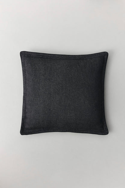 Kamelya cushion with piped edges in natural linen with subtle sheen