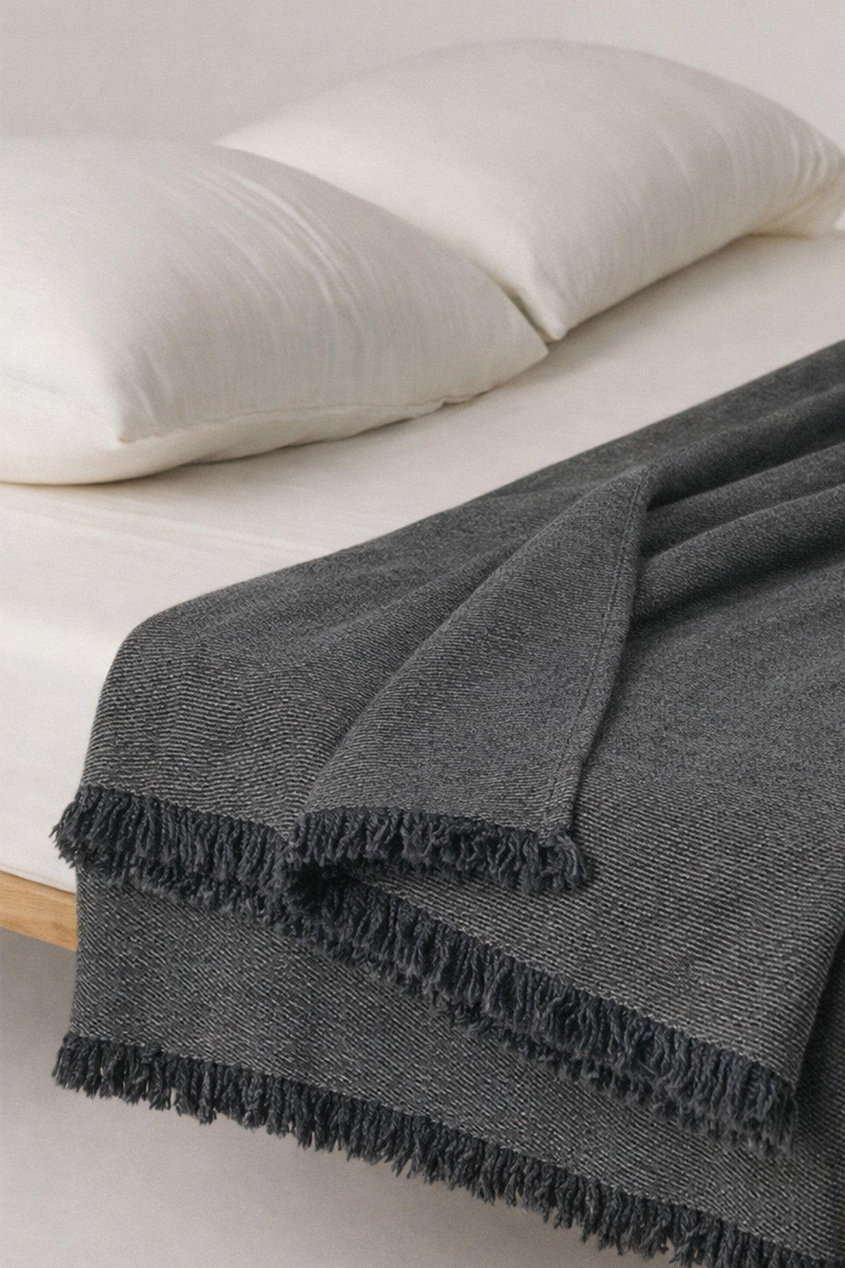 Oslo gray wool throw with fringed edges and contrast stripe detail